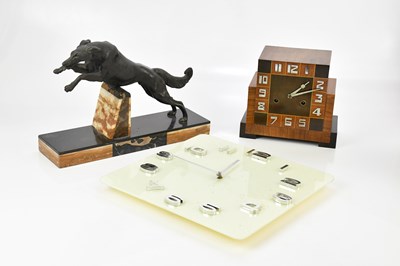 Lot 1318 - An Art Deco walnut and ebonised mantel clock...