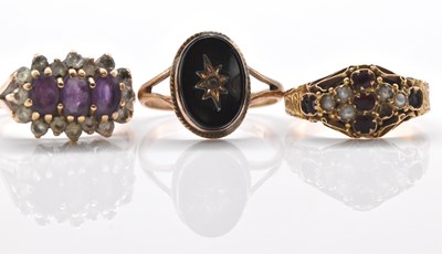 Lot 460A - A 9ct gold mourning ring, together with two...