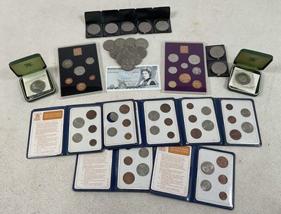 Lot 596 - Two cased commemorative Elizabeth II crowns...