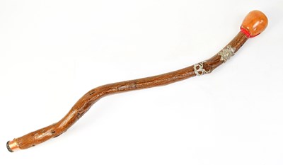 Lot 908 - A 20th century wrythen wooden walking stick,...