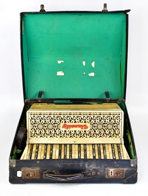 Lot 953 - VARSITY; a mother-of-pearl style accordion, in...