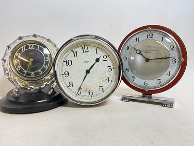 Lot 641 - Three mid-20th century clocks, including a...