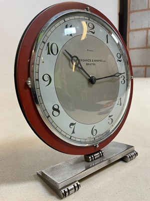 Lot 641 - Three mid-20th century clocks, including a...