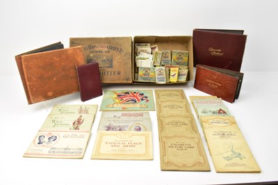 Lot 1044 - Nineteen albums of cigarette cards including...