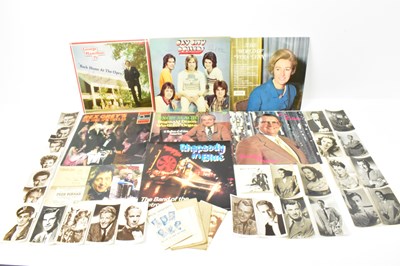 Lot 1040 - A collection albums and photo cards relating...