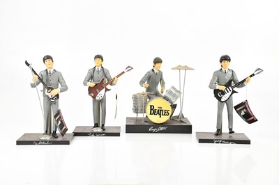 Lot 2024 - THE BEATLES; a set of four Beatles figures by...