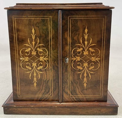 Lot 9 - A Victorian walnut marquetry inlaid table top...