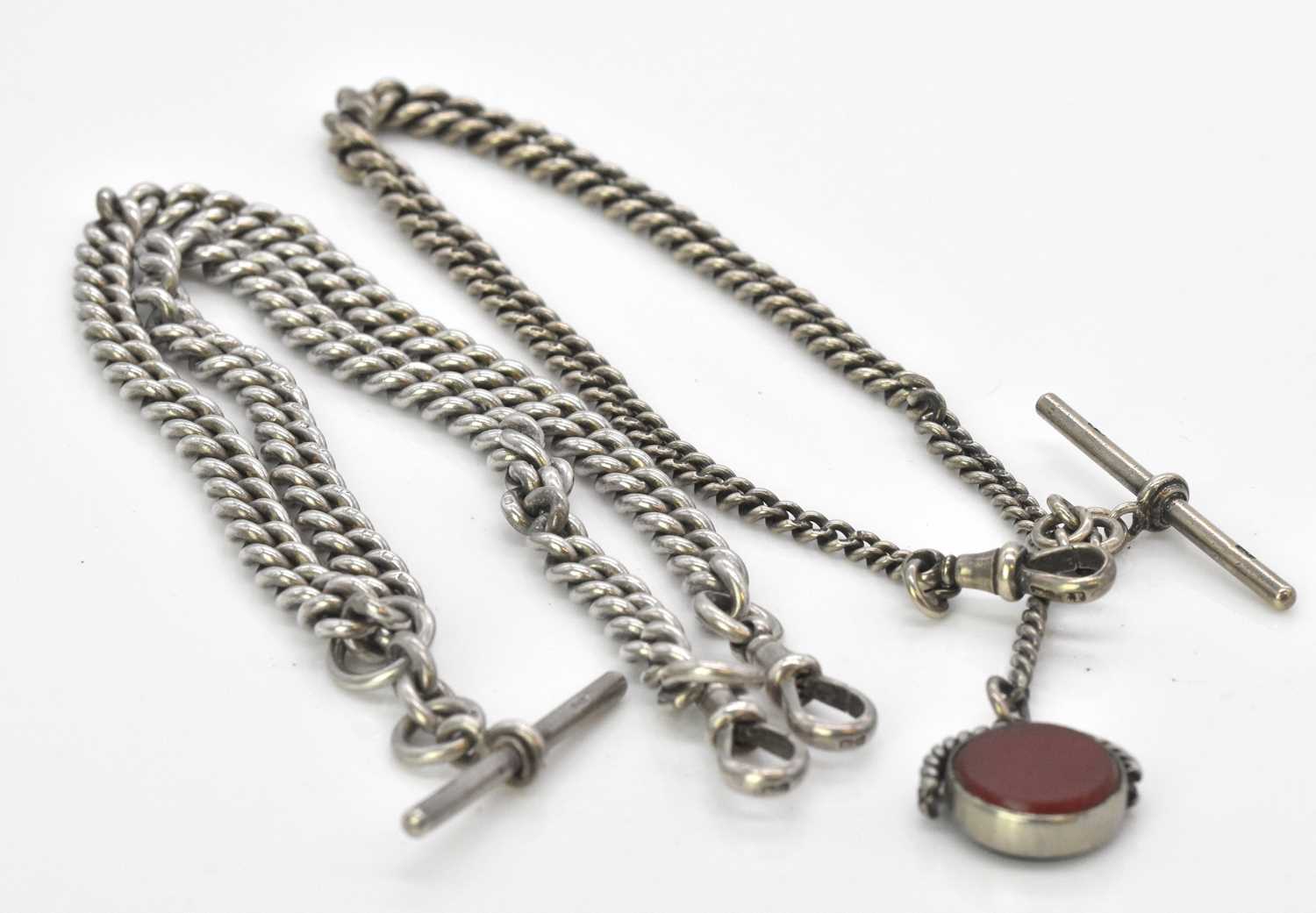 Lot 508 - A silver Albert chain with T-bar and double...