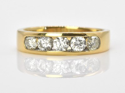 Lot 458 - An 18ct yellow gold five stone diamond ring,...