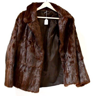 Lot 546 - A brown fur coat and a brown mink fur jacket (2).