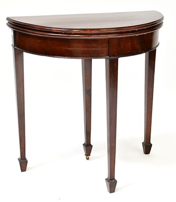 Lot 15 - An early 20th century mahogany demi-lune...