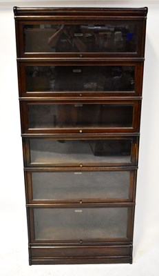 Lot 12 - GLOBE-WERNICKE; an early 20th century oak...