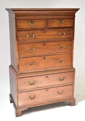 Lot 18 - An early 20th century oak chest-on-chest in...