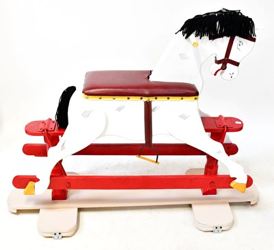 Lot 460 - A 20th century rocking horse with leatherette...