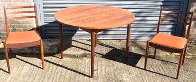 Lot 80 - A teak circular dining table, diameter 112cm,...