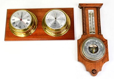 Lot 102 - A 1930s oak barometer and thermometer,...