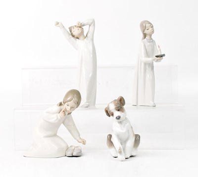 Lot 108 - LLADRO; three figures of children in night...