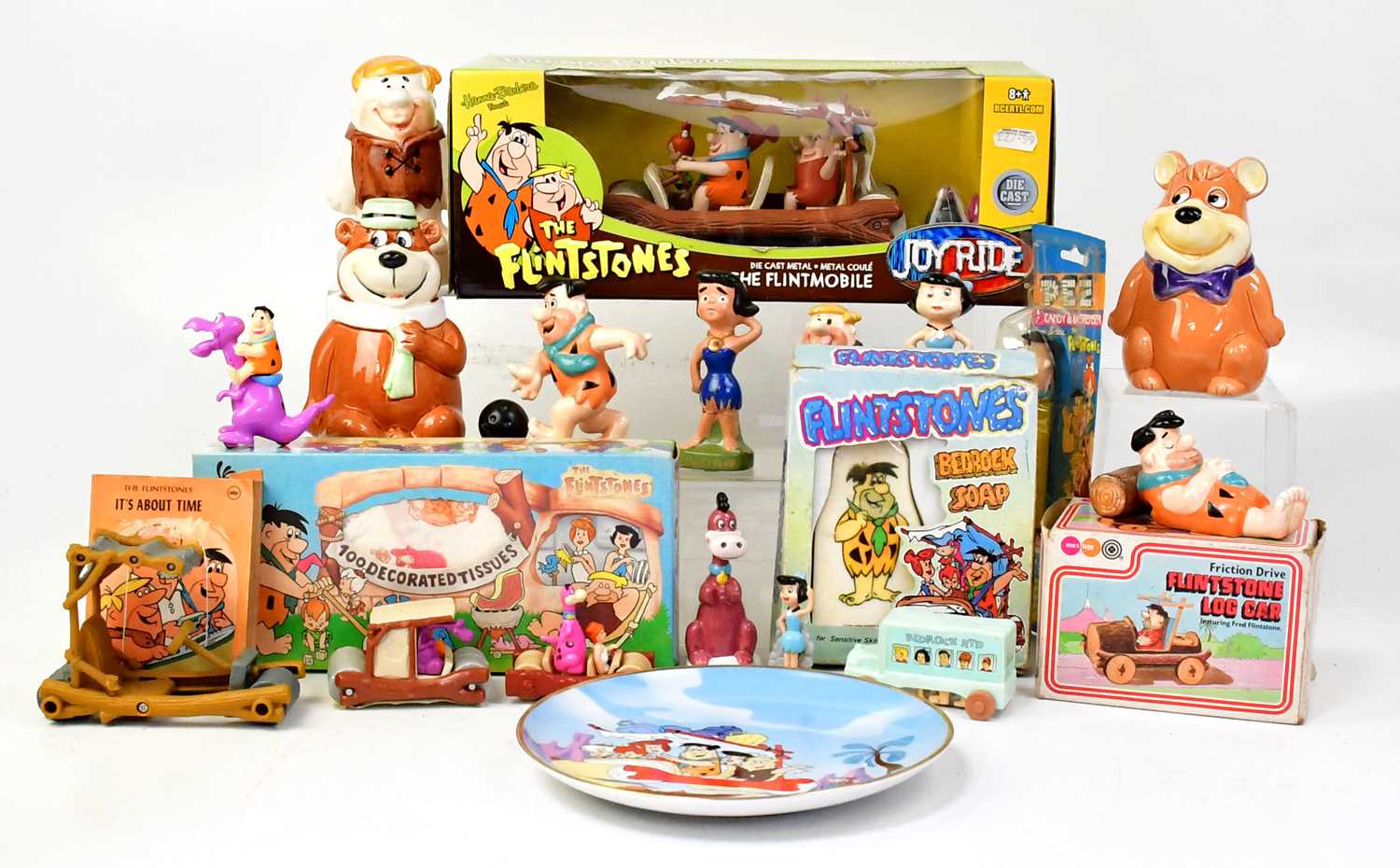 Lot 637 - THE FLINTSTONES; various toys relating to the...