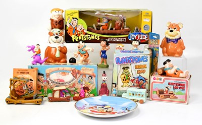 Lot 637 - THE FLINTSTONES; various toys relating to the...