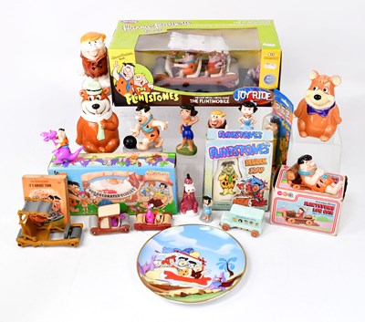 Lot 637 - THE FLINTSTONES; various toys relating to the...