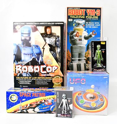 Lot 547 - ROBOTS; a collection of space related toys,...