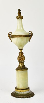 Lot 130 - A brass and pale green marble column table...