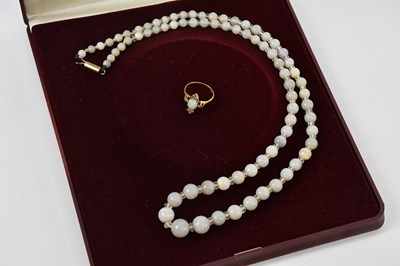 Lot 490 - An opal beaded necklace with yellow metal...