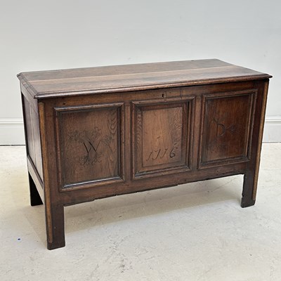 Lot 1102 - An 18th century three panel oak blanket box,...