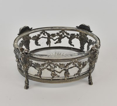 Lot 1143 - An early 20th century white metal glass lined...