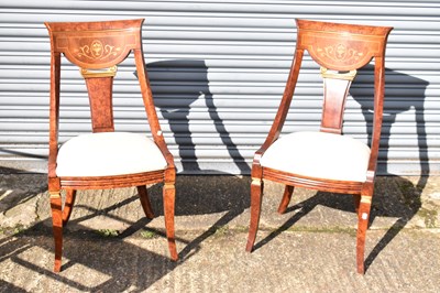 Lot 33 - A pair of modern ornate salon chairs.