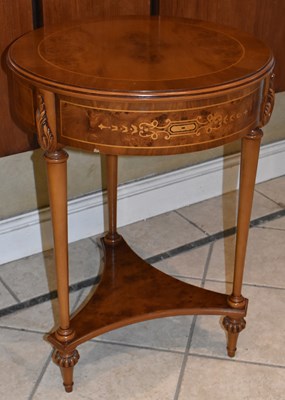 Lot 90 - A reproduction circular walnut side table,...