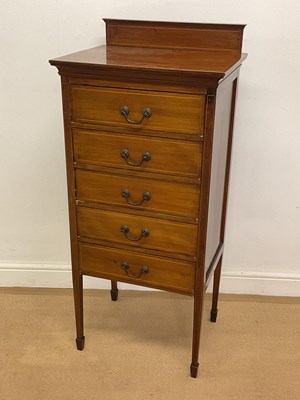 Lot 769 - An Edwardian mahogany music cabinet, with five...