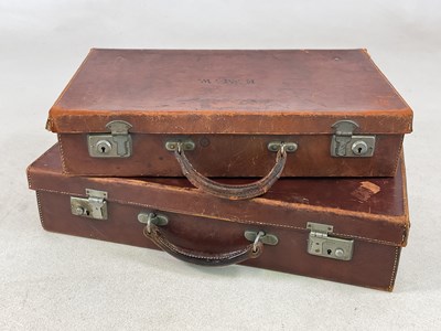 Lot 93 - Two leather suitcases: largest 51x27x11cm.
