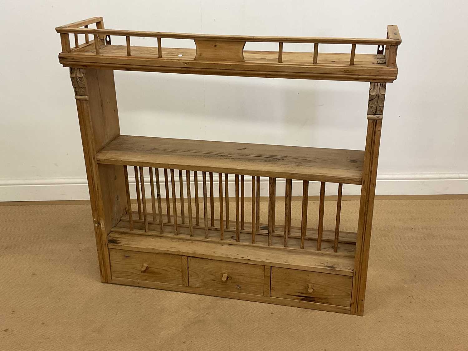 Lot 736 - A pine wall mounted kitchen drying rack with...