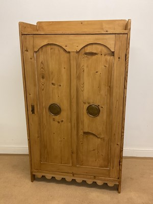 Lot 713 - A pine kitchen cupboard with two small over...