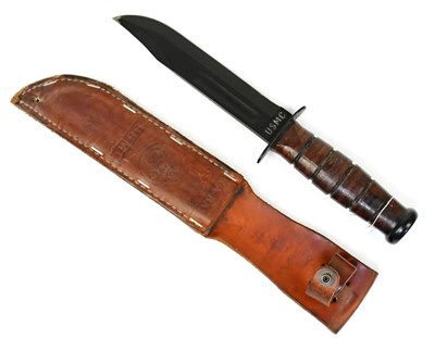 Lot 869 - KA-BAR; a boxed U.S.M.C fighting knife with 17....