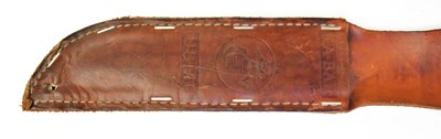 Lot 869 - KA-BAR; a boxed U.S.M.C fighting knife with 17....