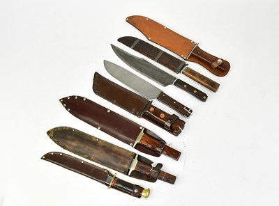 Lot 902 - Seven Bowie knives including a wooden-handled...