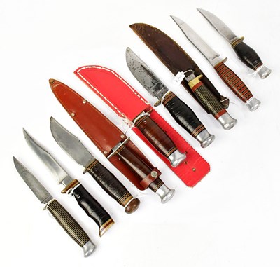 Lot 879 - A collection of hunting knives, including some...
