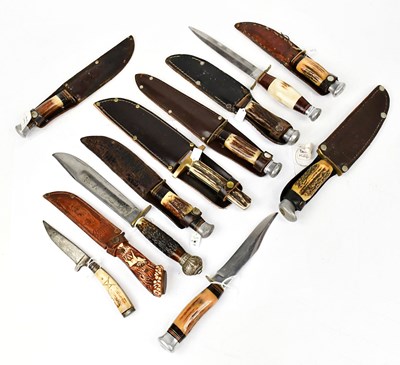 Lot 904 - A collection of bone-handled hunting knives,...