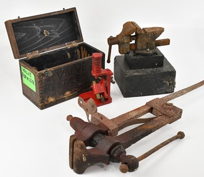 Lot 1292 - A cased valve refaced, together with two vices.