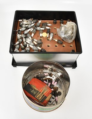 Lot 1369 - A collection of 18mm spark plugs.