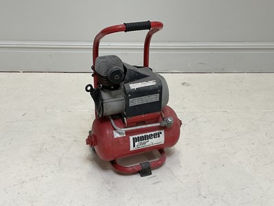 Lot 1457 - PIONEER; an air compressor.
