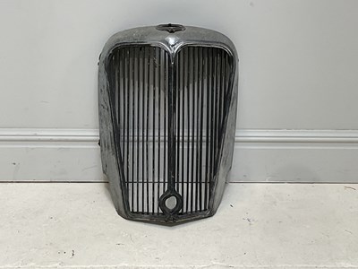 Lot 1408 - A radiator grille possibly from a Rover, 68cm.