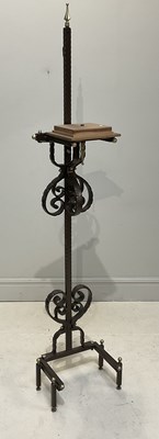 Lot 1288 - A wrought iron plane stand, height 235cm.