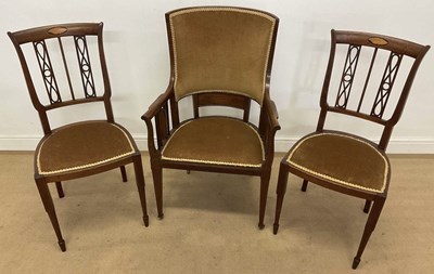 Lot 723 - An Edwardian mahogany inlaid tub chair fitted...