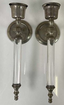 Lot 657 - A pair of lucite style wall mounted candle...