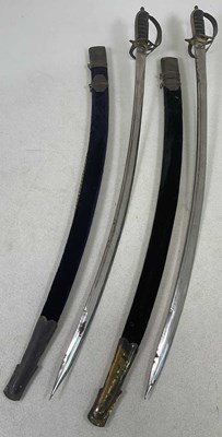 Lot 102 - A pair of cavalry swords, both examples made...