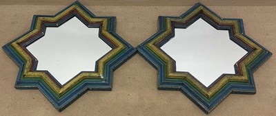 Lot 708 - A pair of mirrors in painted wooden star...