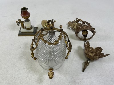 Lot 645 - A decorative crystal and brass pendant light,...